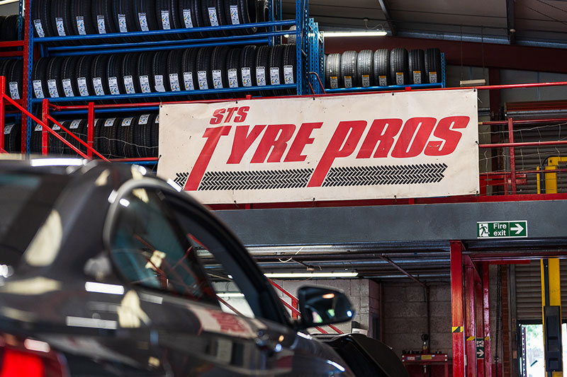 Tyrepros Banner in garage